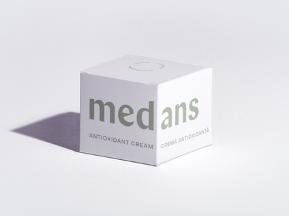 Box of medans antioxidant cream on a light gray background